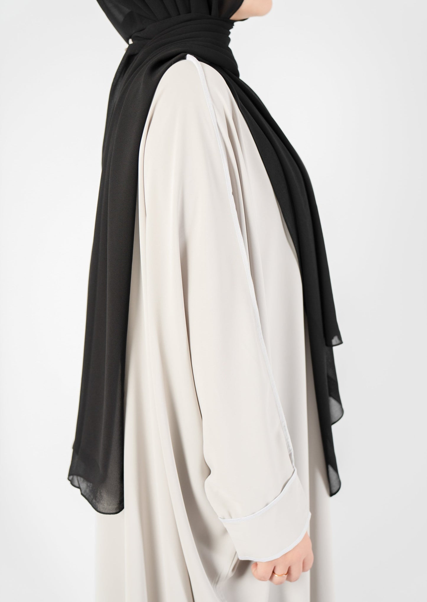 Introducing the 'Tie Back Instant Hijab' which features our Premium Chiffon shawl stitched to our Cotton Lycra Inner cap. The tie-back feature allows adjustment of tightness to ensure versatility and upmost comfort. A perfect blend of two staple tone grays suitable for almost any outfit. Its easy-to-wear nature makes it essential in every wardrobe.