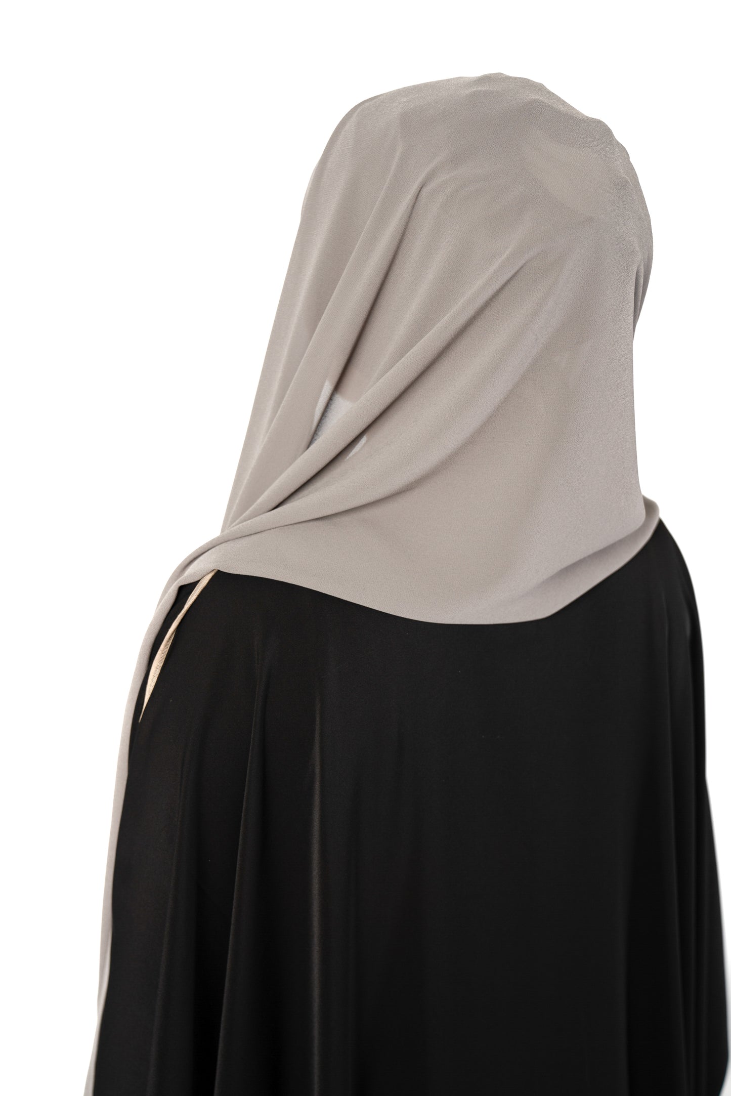 Introducing the 'Tie Back Instant Hijab' which features our Premium Chiffon shawl stitched to our Cotton Lycra Inner cap. The tie-back feature allows adjustment of tightness to ensure versatility and upmost comfort. A perfect blend of two staple tone grays suitable for almost any outfit. Its easy-to-wear nature makes it essential in every wardrobe.