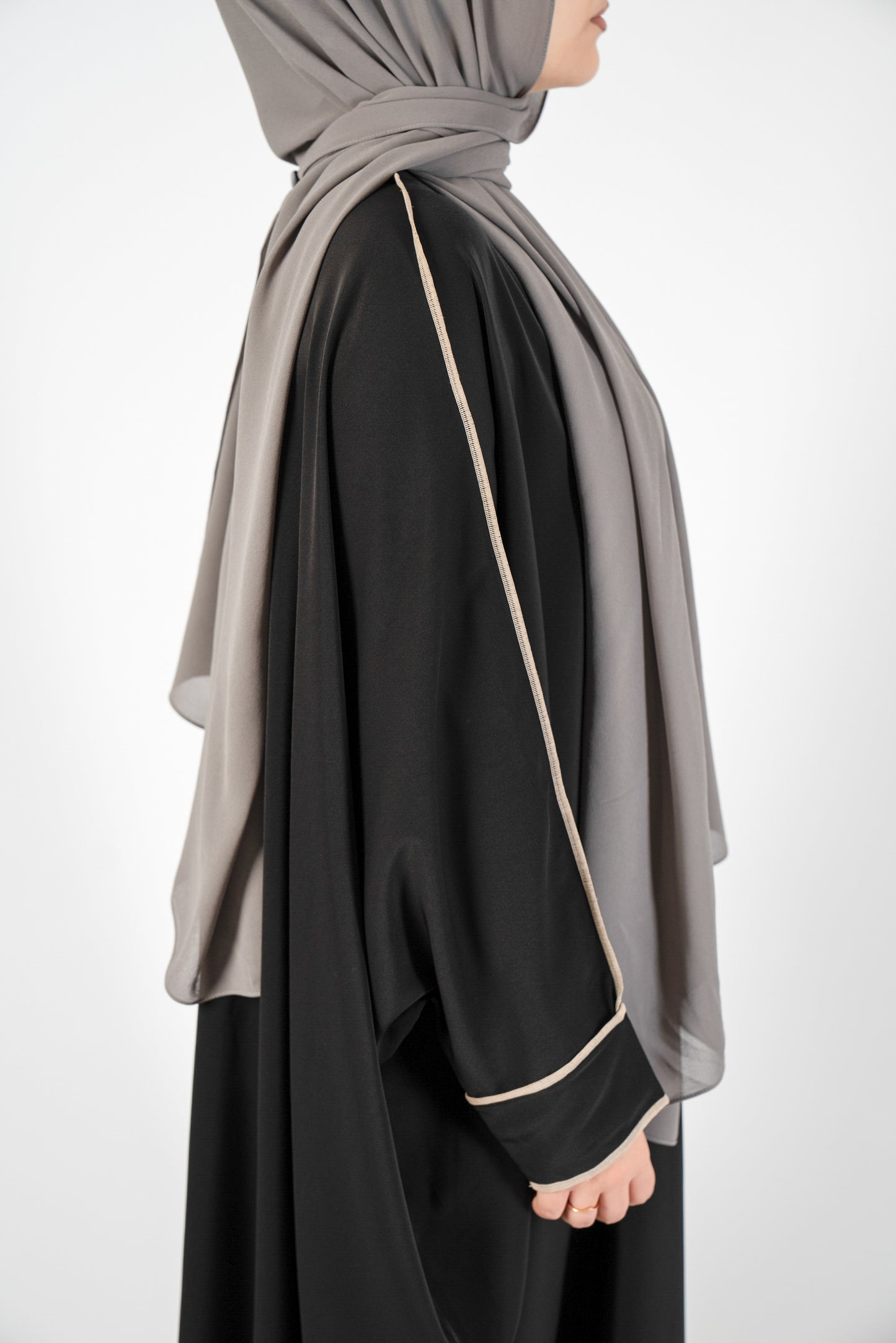 Introducing the 'Tie Back Instant Hijab' which features our Premium Chiffon shawl stitched to our Cotton Lycra Inner cap. The tie-back feature allows adjustment of tightness to ensure versatility and upmost comfort. A perfect blend of two staple tone grays suitable for almost any outfit. Its easy-to-wear nature makes it essential in every wardrobe.