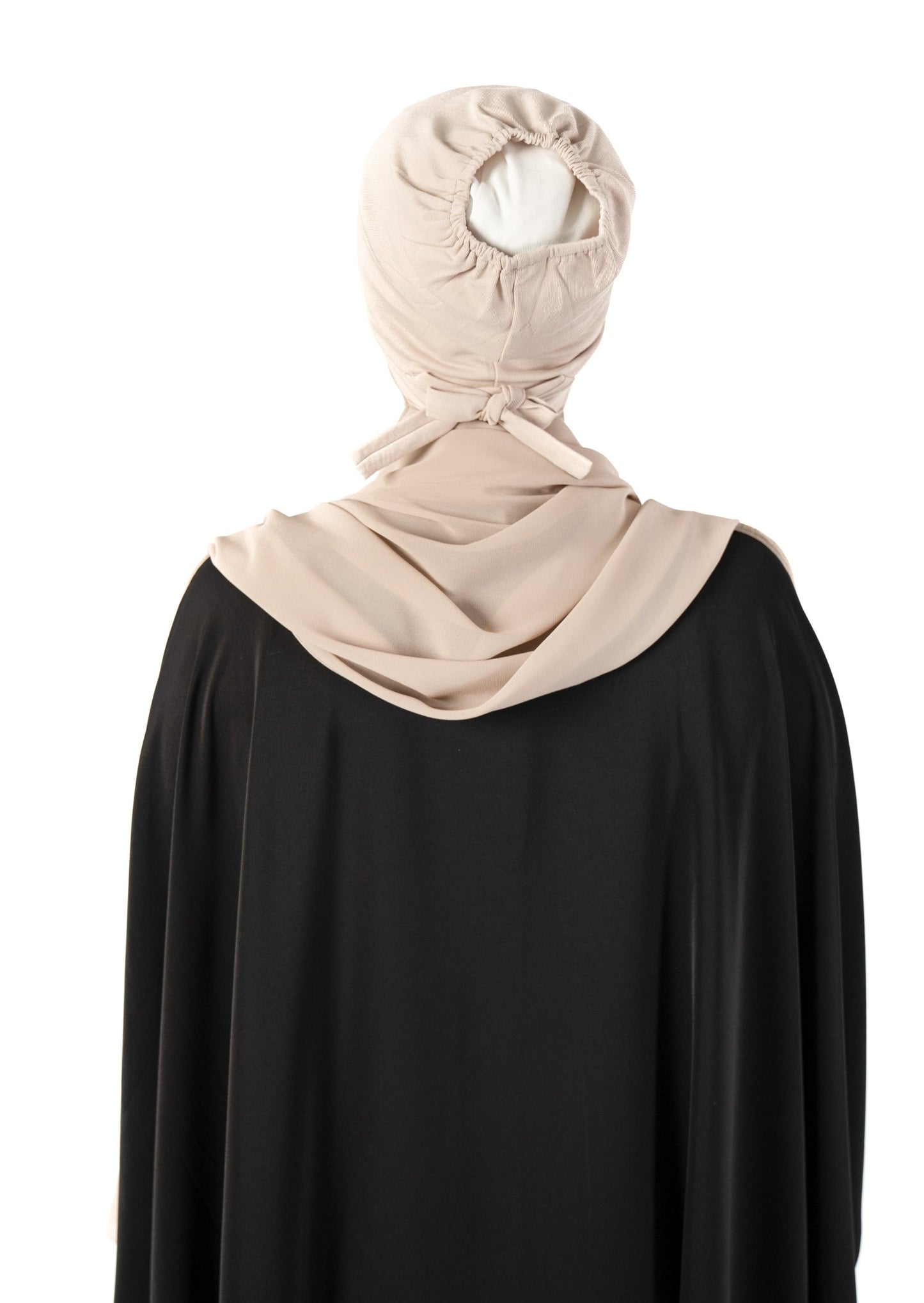 Introducing the 'Tie Back Instant Hijab' which features our Premium Chiffon shawl stitched to our Cotton Lycra Inner cap. The tie-back feature allows adjustment of tightness to ensure versatility and upmost comfort. A perfect blend of two staple tone nudes suitable for almost any outfit. Its easy-to-wear nature makes it essential in every wardrobe. Premium Chiffon, delicate and chic in appearance Highest quality Cotton Lycra Hijab Measurements: 187cm * 72cm