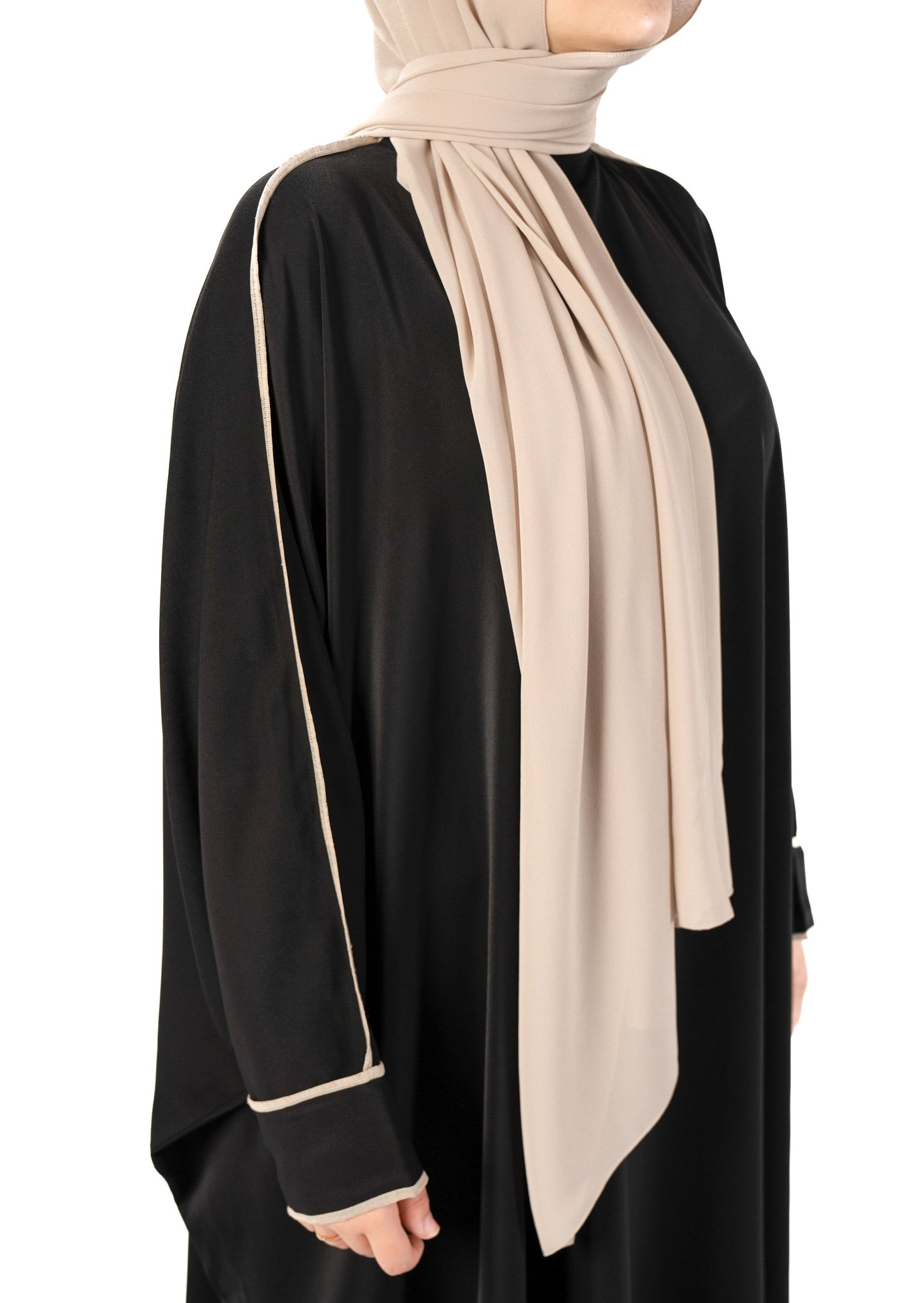 Introducing the 'Tie Back Instant Hijab' which features our Premium Chiffon shawl stitched to our Cotton Lycra Inner cap. The tie-back feature allows adjustment of tightness to ensure versatility and upmost comfort. A perfect blend of two staple tone nudes suitable for almost any outfit. Its easy-to-wear nature makes it essential in every wardrobe. Premium Chiffon, delicate and chic in appearance Highest quality Cotton Lycra Hijab Measurements: 187cm * 72cm