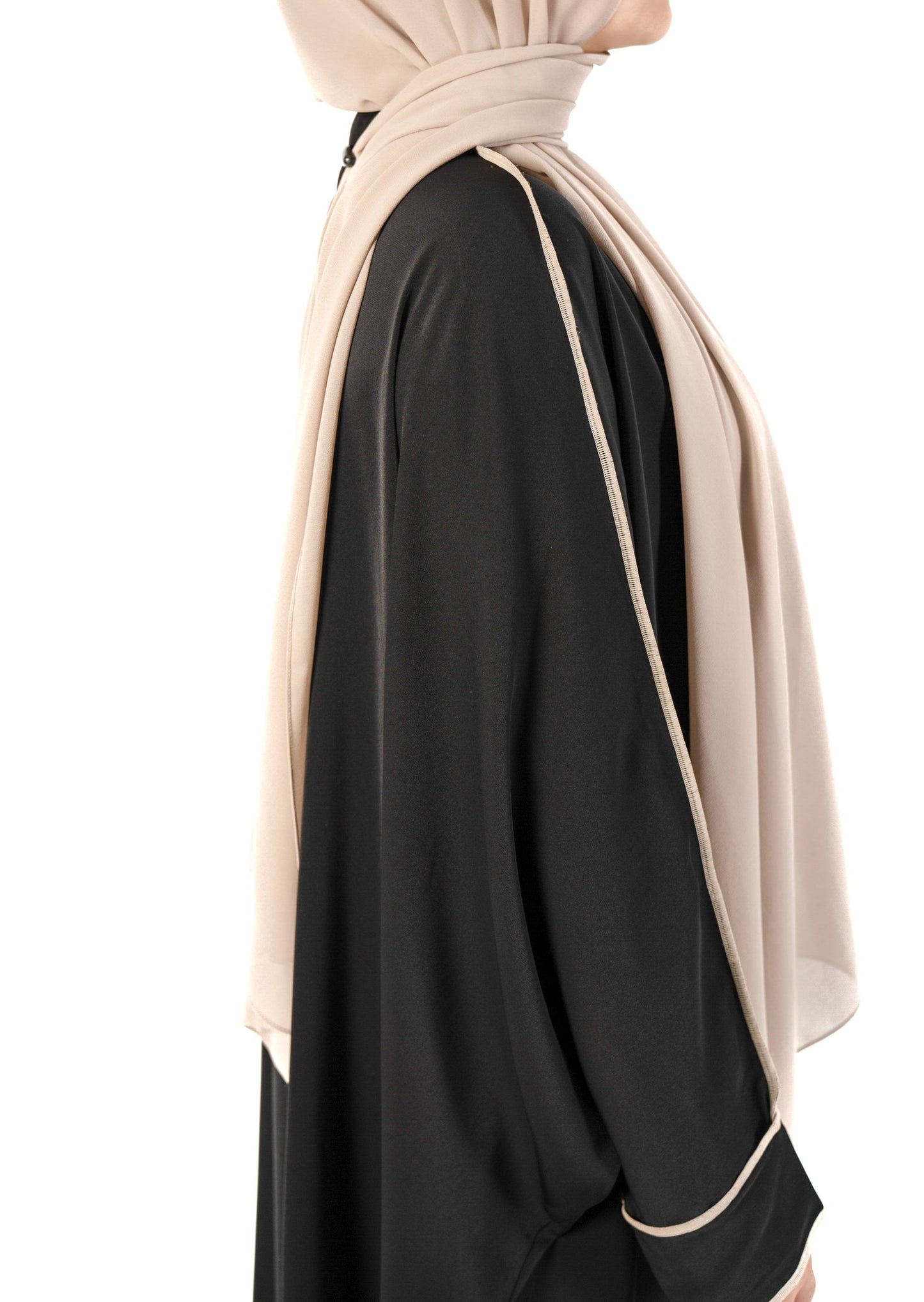 Introducing the 'Tie Back Instant Hijab' which features our Premium Chiffon shawl stitched to our Cotton Lycra Inner cap. The tie-back feature allows adjustment of tightness to ensure versatility and upmost comfort. A perfect blend of two staple tone nudes suitable for almost any outfit. Its easy-to-wear nature makes it essential in every wardrobe. Premium Chiffon, delicate and chic in appearance Highest quality Cotton Lycra Hijab Measurements: 187cm * 72cm