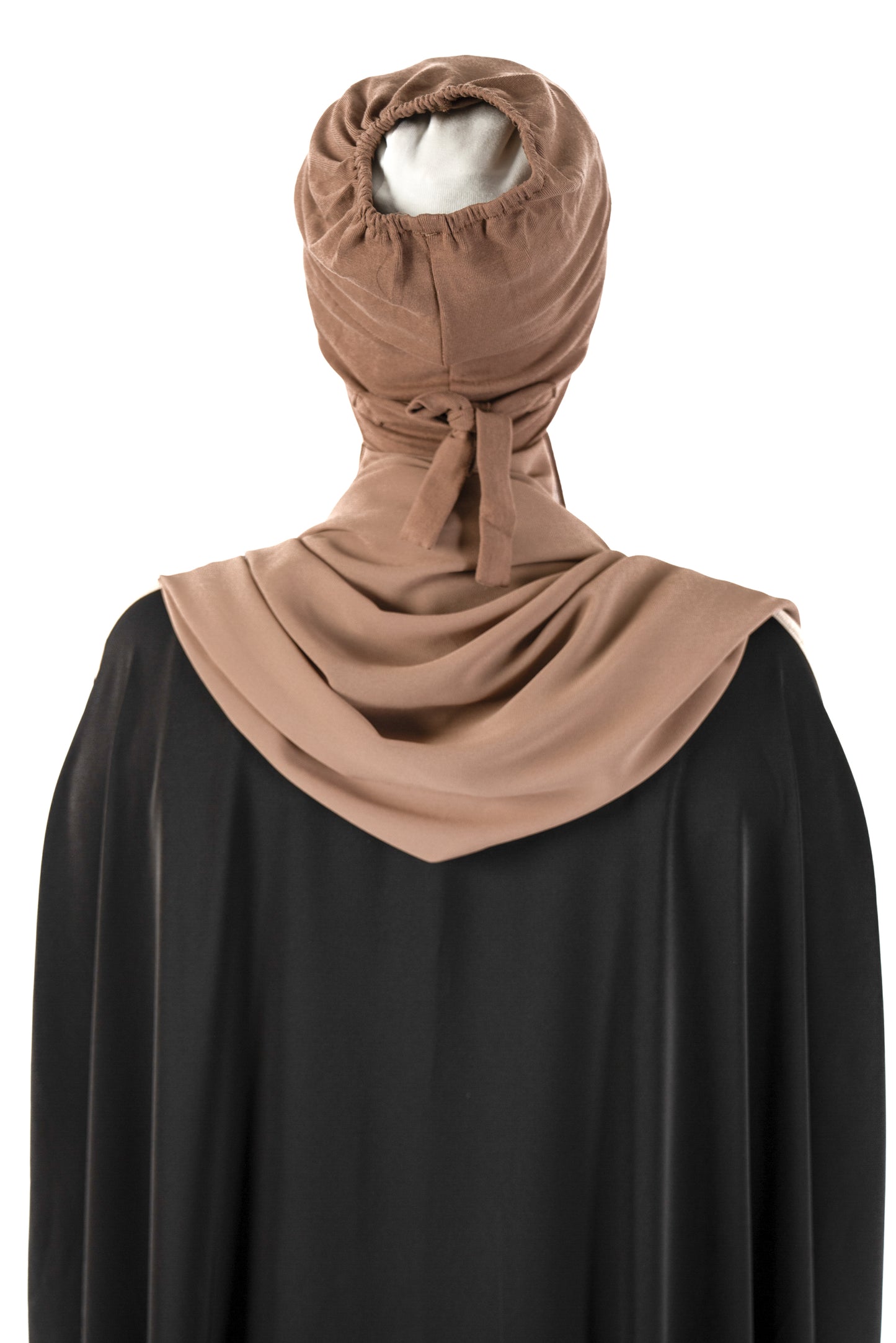 Introducing the 'Tie Back Instant Hijab' which features our Premium Chiffon shawl stitched to our Cotton Lycra Inner cap. The tie-back feature allows adjustment of tightness to ensure versatility and upmost comfort. A perfect blend of two staple browns suitable for almost any outfit. Its easy-to-wear nature makes it essential in every wardrobe.