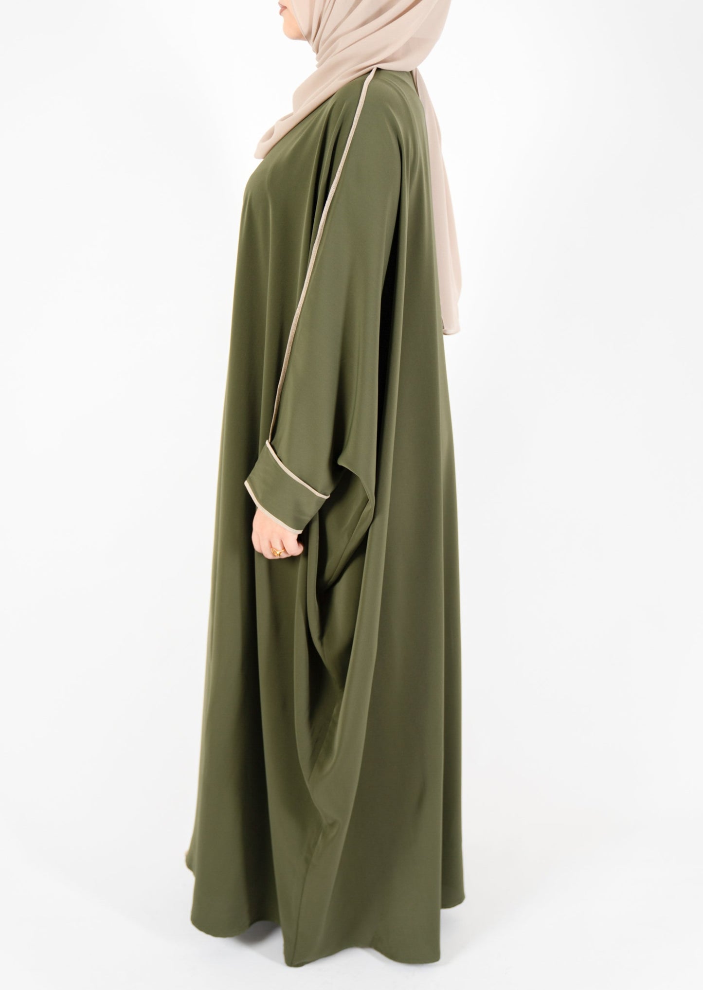 Khaki green abaya. Kaftan style abaya. bat wing abaya. breezy abaya. flowy modest hijabi abaya. set. Modest and affordable hijab and abaya. Pretty abaya. Proper hijabi abaya.
