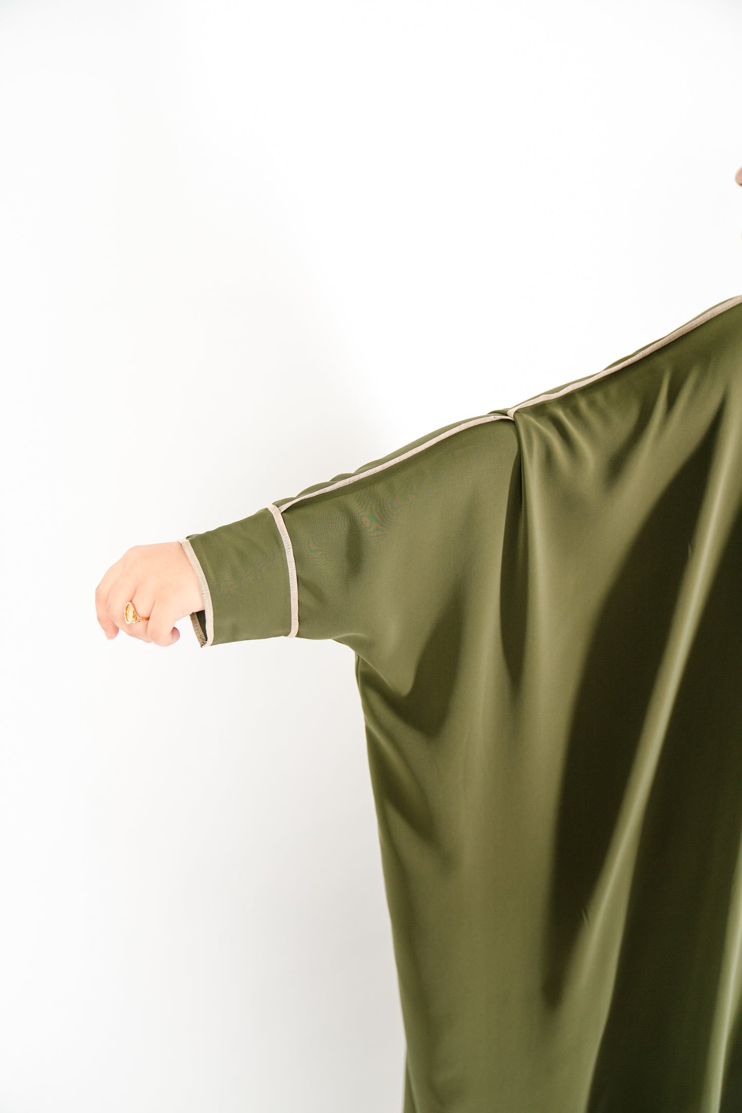 Khaki green abaya. Kaftan style abaya. bat wing abaya. breezy abaya. flowy modest hijabi abaya. set. Modest and affordable hijab and abaya. Pretty abaya. Proper hijabi abaya.