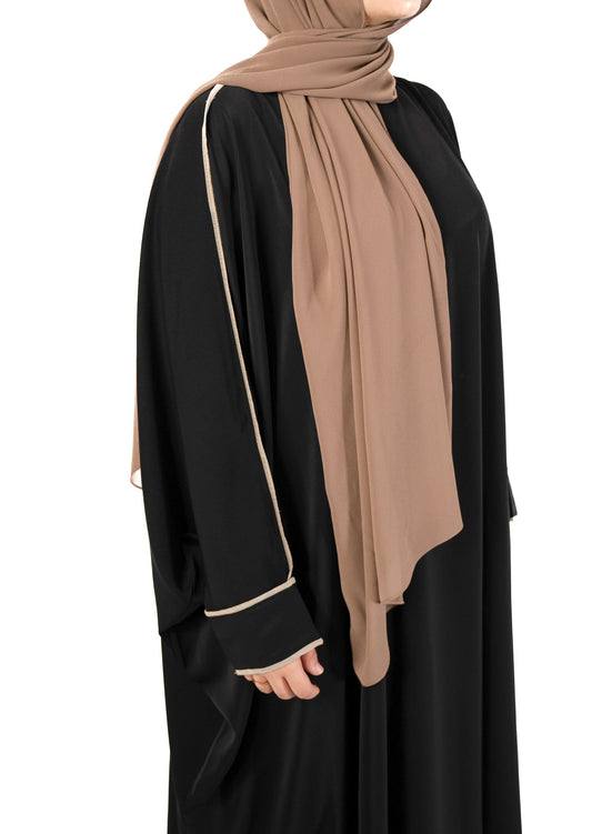Introducing the 'Tie Back Instant Hijab' which features our Premium Chiffon shawl stitched to our Cotton Lycra Inner cap. The tie-back feature allows adjustment of tightness to ensure versatility and upmost comfort. A perfect blend of two staple browns suitable for almost any outfit. Its easy-to-wear nature makes it essential in every wardrobe.